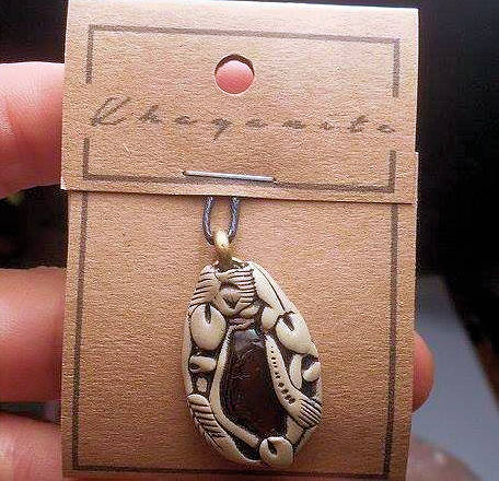 Garnet in Decorative Clay Pendant Necklace