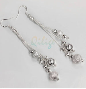 earrings long silver balls
