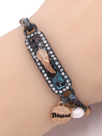 Rhinestone Accented Patina Bracelet with Wing and "Blessed" Charm