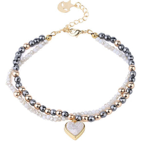 Delicate and stunning multi layer bracelet with heart