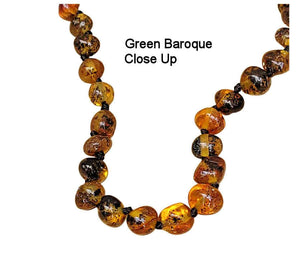 Close up of Green Baroque Beads on teething Necklace