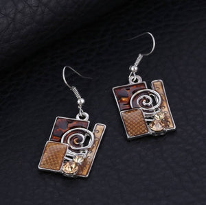 Brown and Tan Earring with Swirl and Unusual design